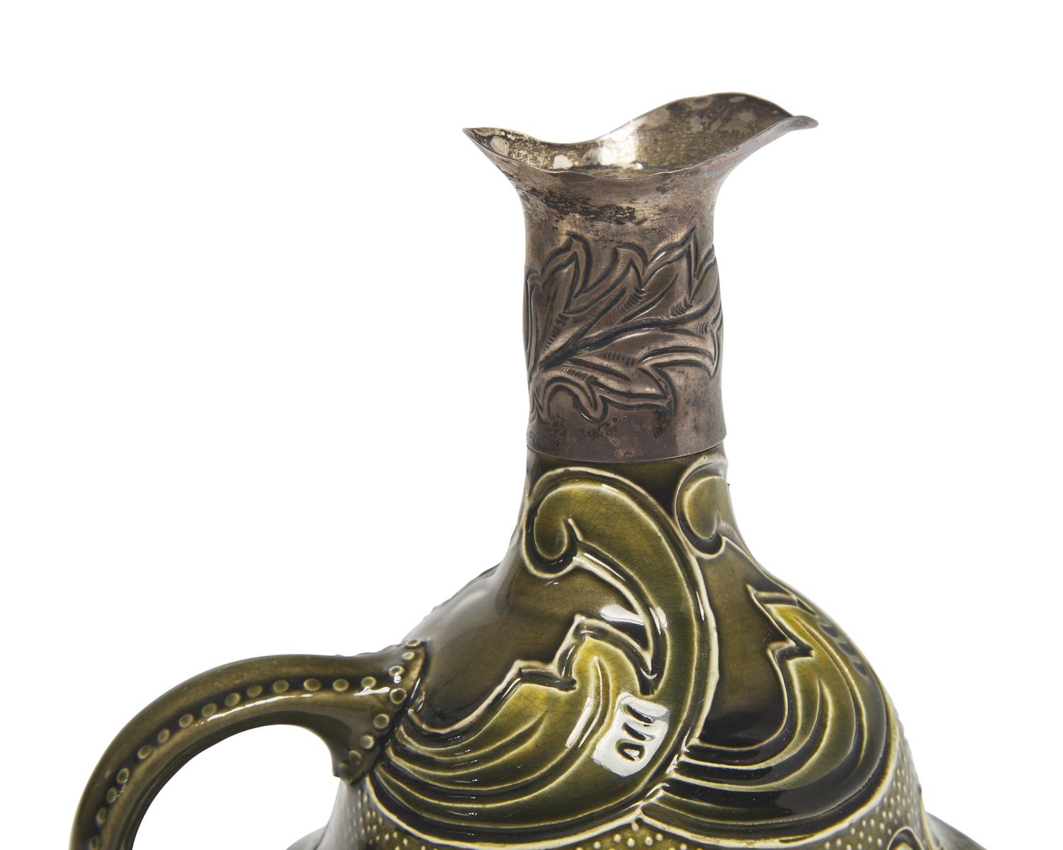 A Wedgwood Motto Jug with Applied Silver Spout