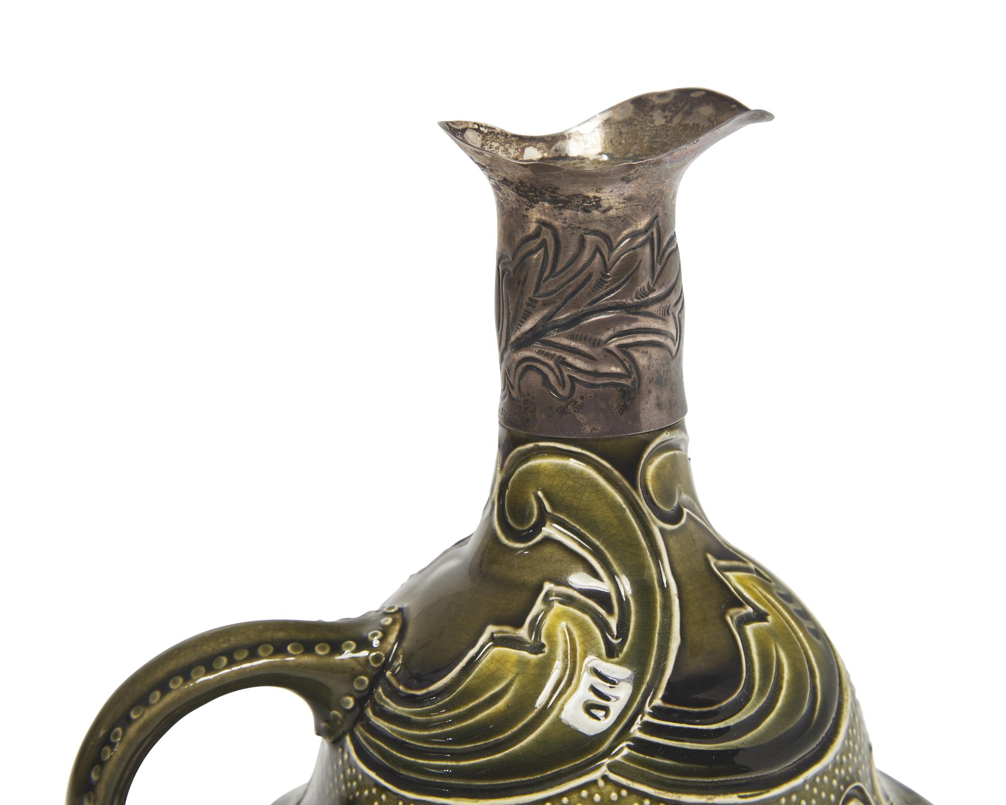 A Wedgwood Motto Jug with Applied Silver Spout