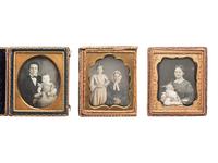 [EARLY PHOTOGRAPHY]. 6 daguerreotypes of parents with children, posed affectionately.