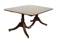 A Baker George III Style Mahogany Double-Pedestal Dining Table