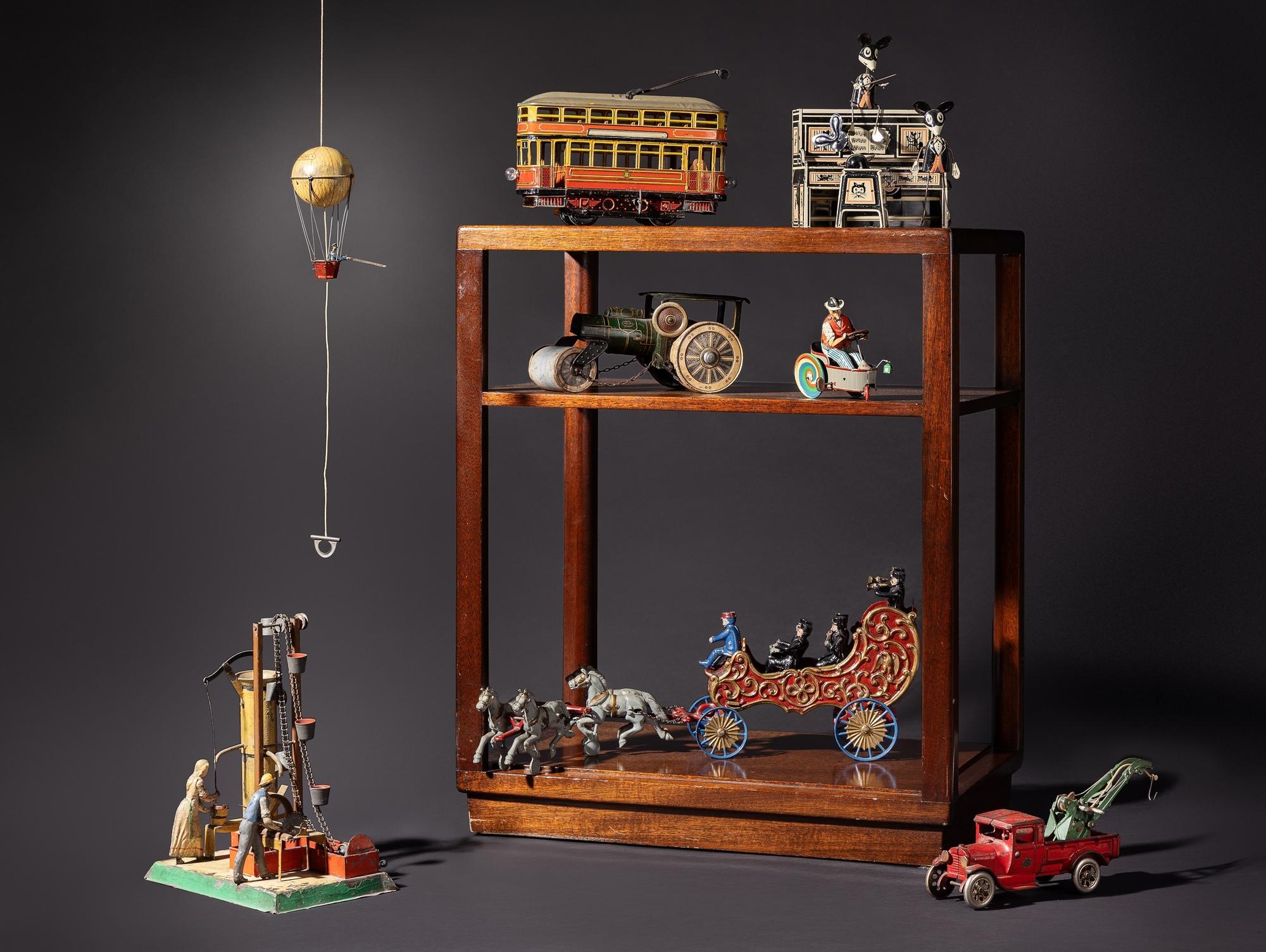 Interiors, Featuring a Collection of Cast Iron and Tin Lithograph Toys