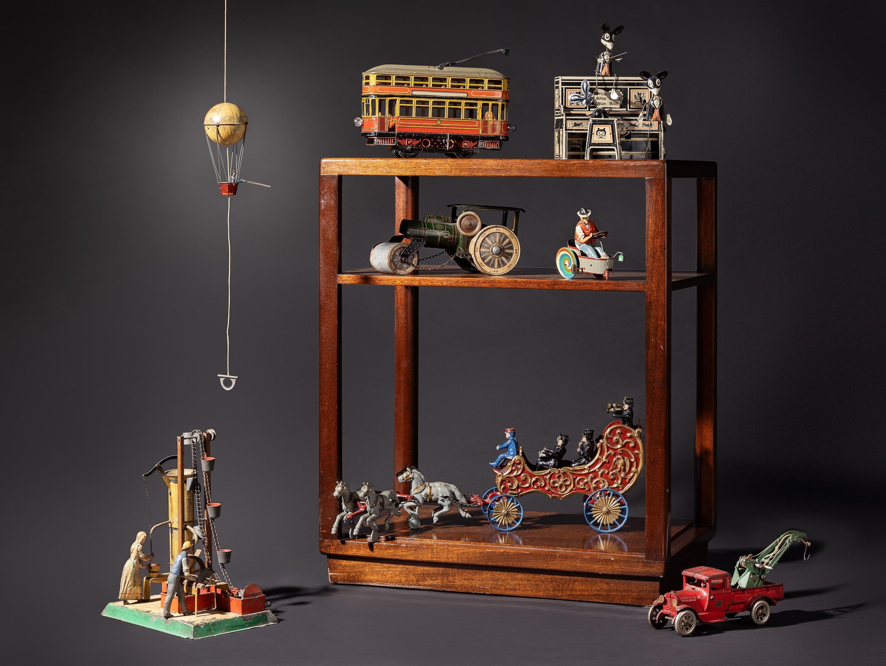 Interiors, Featuring a Collection of Cast Iron and Tin Lithograph Toys