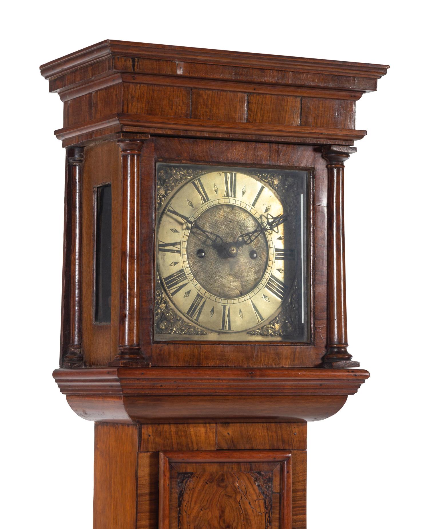 A George II Walnut Tall Case Clock