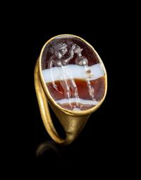 A Roman Gold and Banded Agate Finger Ring with a Warrior
