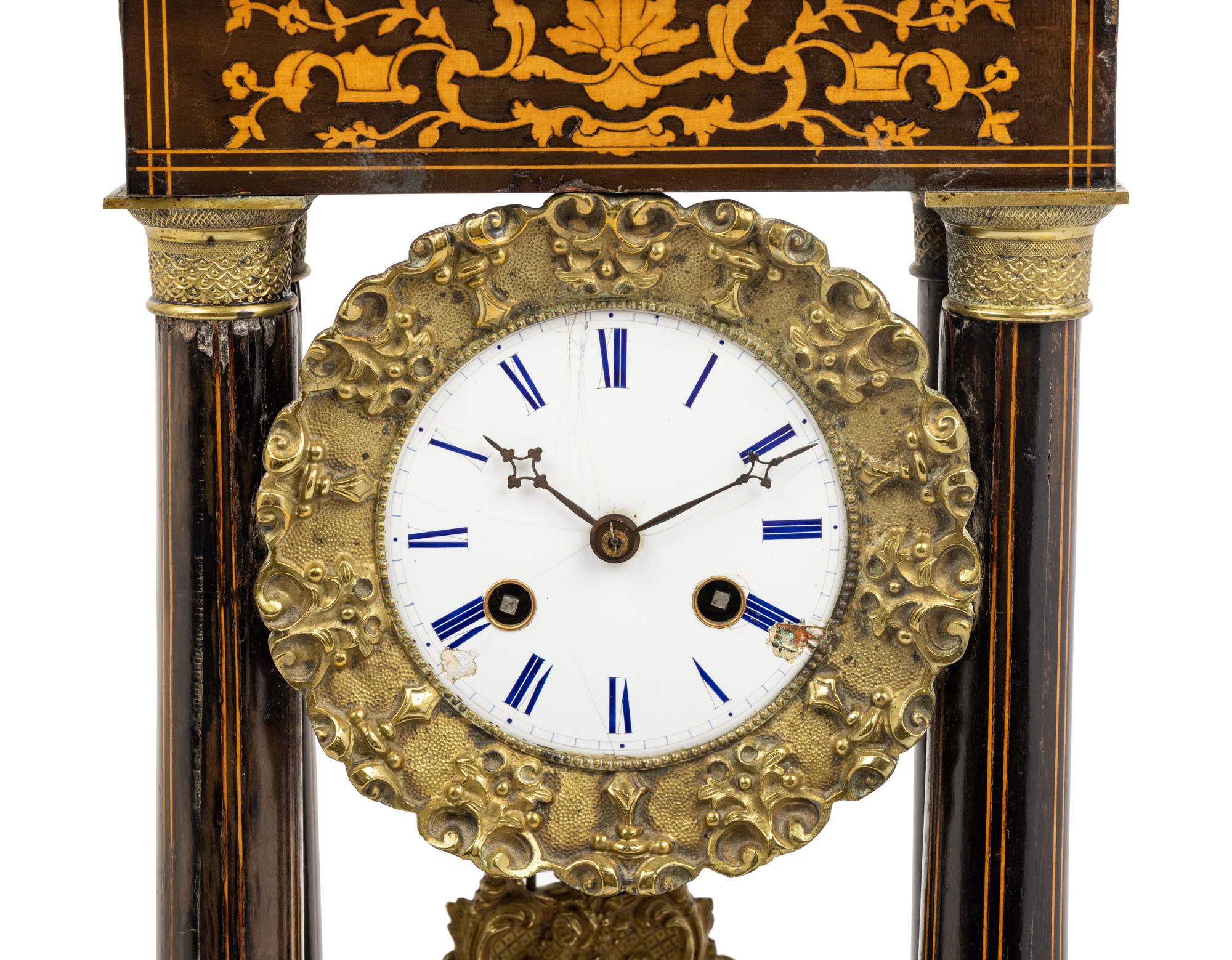 A Charles X Marquetry Mantel Clock
