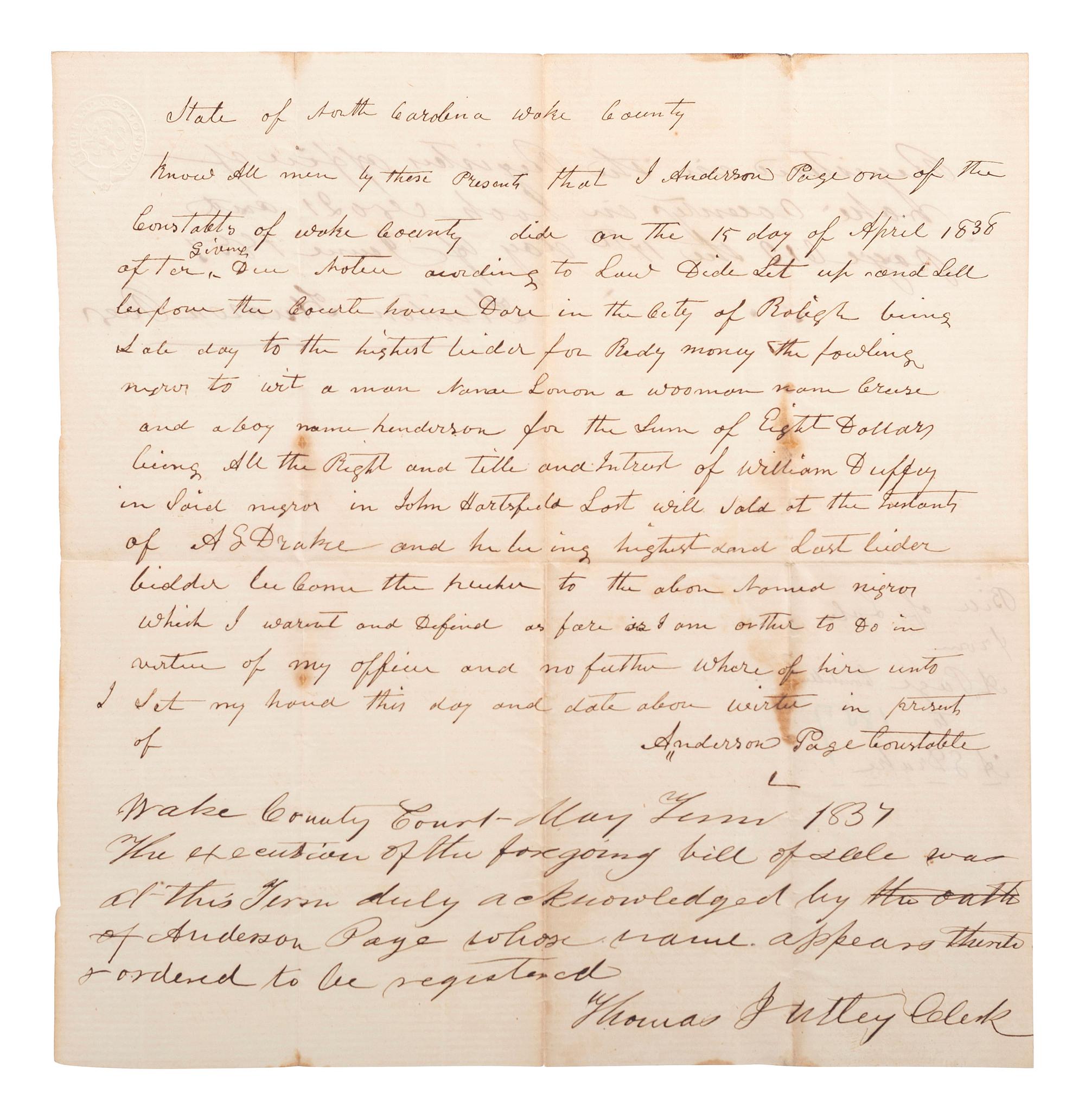 [SLAVERY & ABOLITION]. Manuscript bill of sale for enslaved African Americans "Lonon, "Grase," and "Henderson," auctioned at the courthouse in the city of Raleigh. Wake County, NC, 15 April 1838.