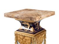 A Pair of Continental Gilt and Transfer-Printed Metal Mounted Marble Pedestals