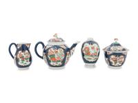 A Royal Worcester Painted and Parcel Gilt Porcelain Tea and Coffee Service