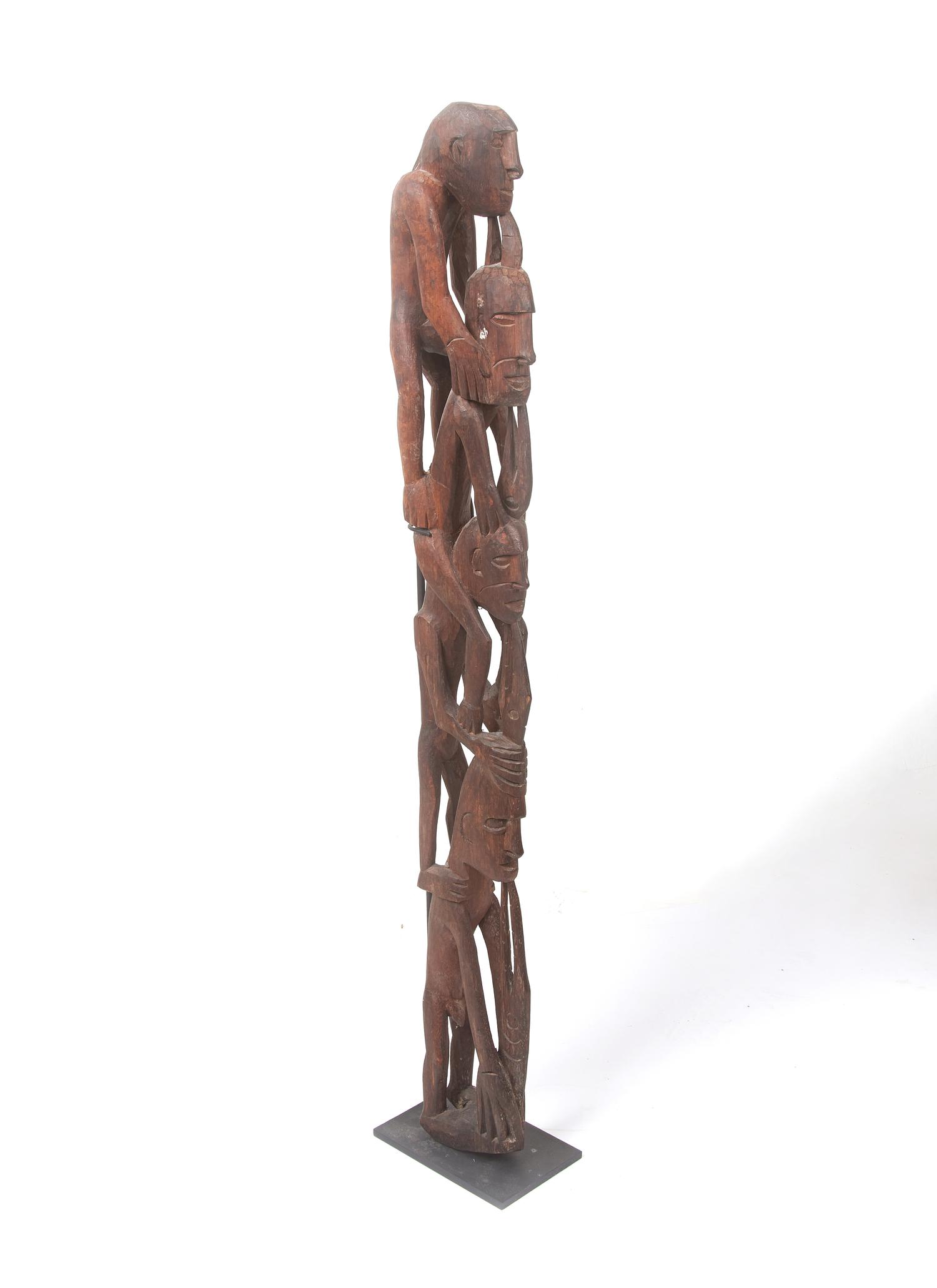 An Asmat Figure COMBINED WITH 31