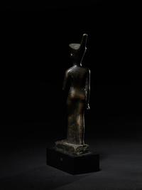 An Egyptian Bronze Striding Neith