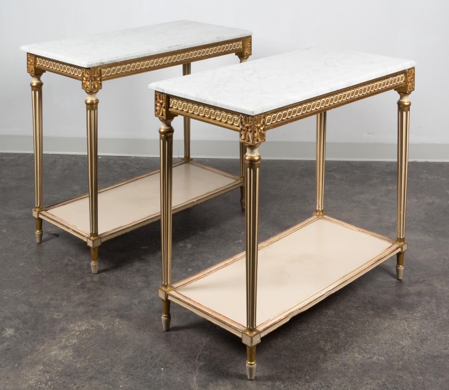 A Pair of Louis XVI Style Painted and Parcel Gilt Console Tables Height 33 x width 36 1/4 x depth 18 inches. — MID 20TH CENTURY