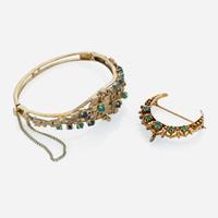 A 14K yellow gold bangle with pendant/brooch