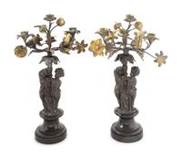 A Pair of Victorian Cast Metal and Parcel Gilt Four-Light Candelabra