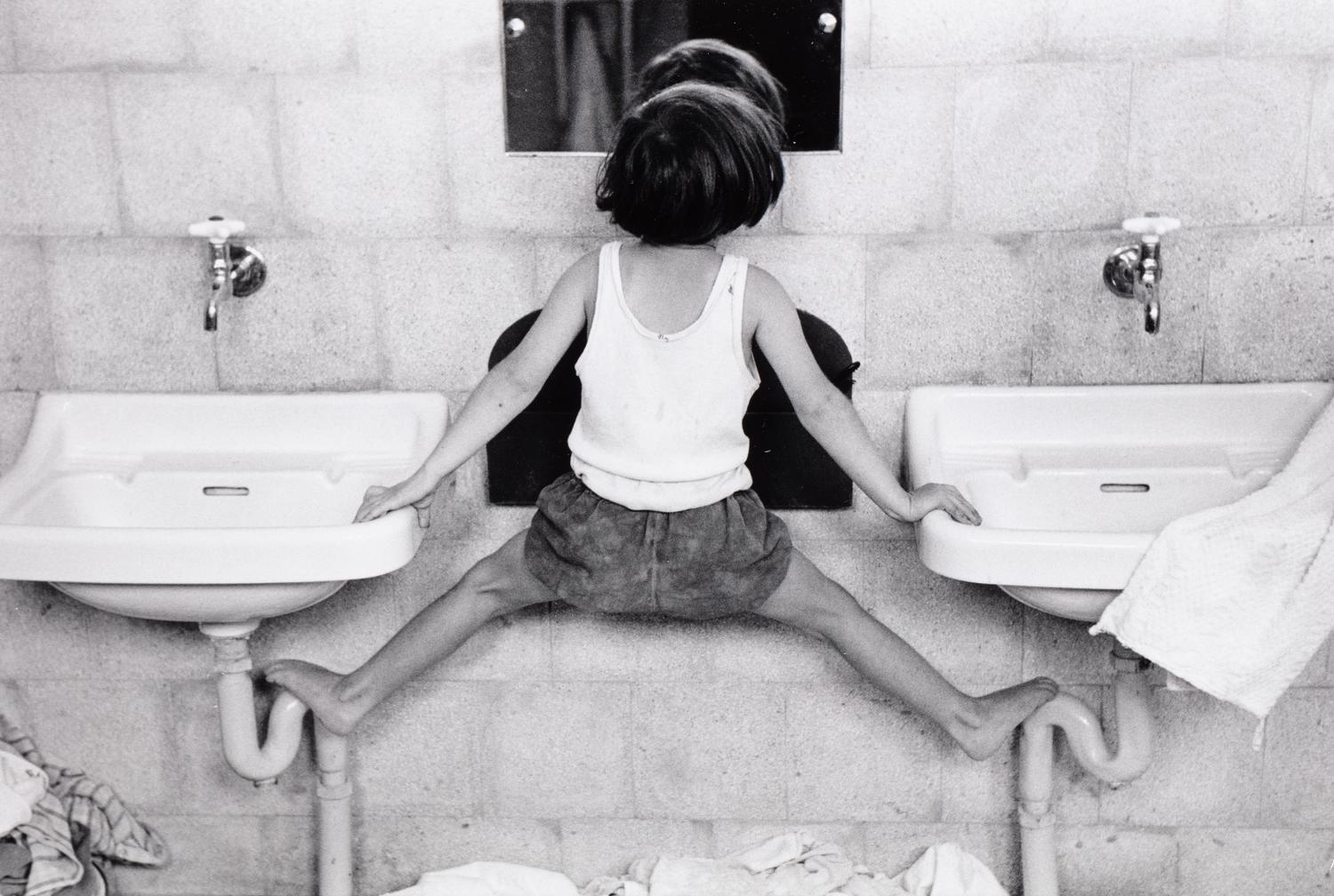 Ruth Orkin (1921-1985) Tirza on Sinks, Israel, 1951
