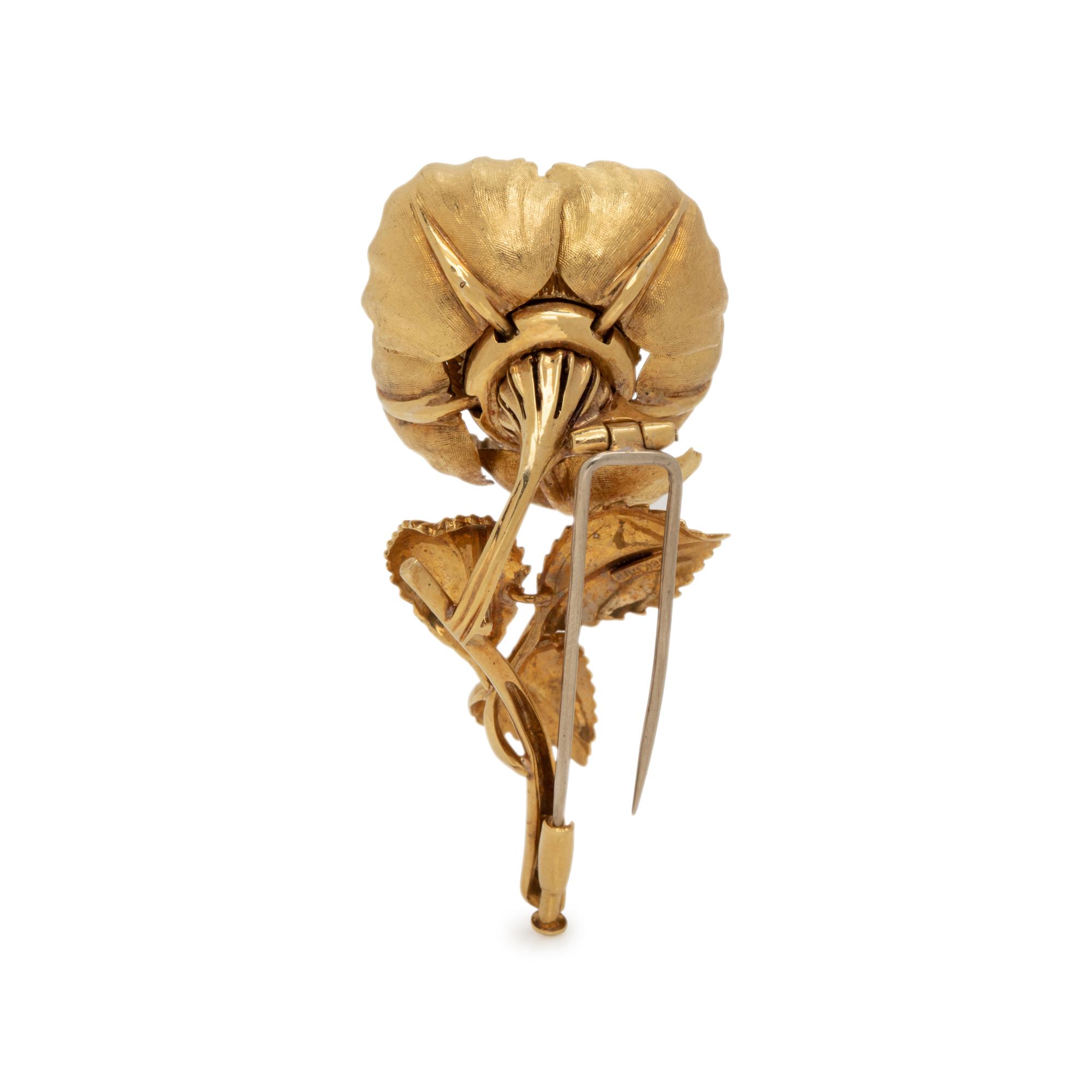 YELLOW GOLD AND GEMSTONE FLOWER BROOCH
