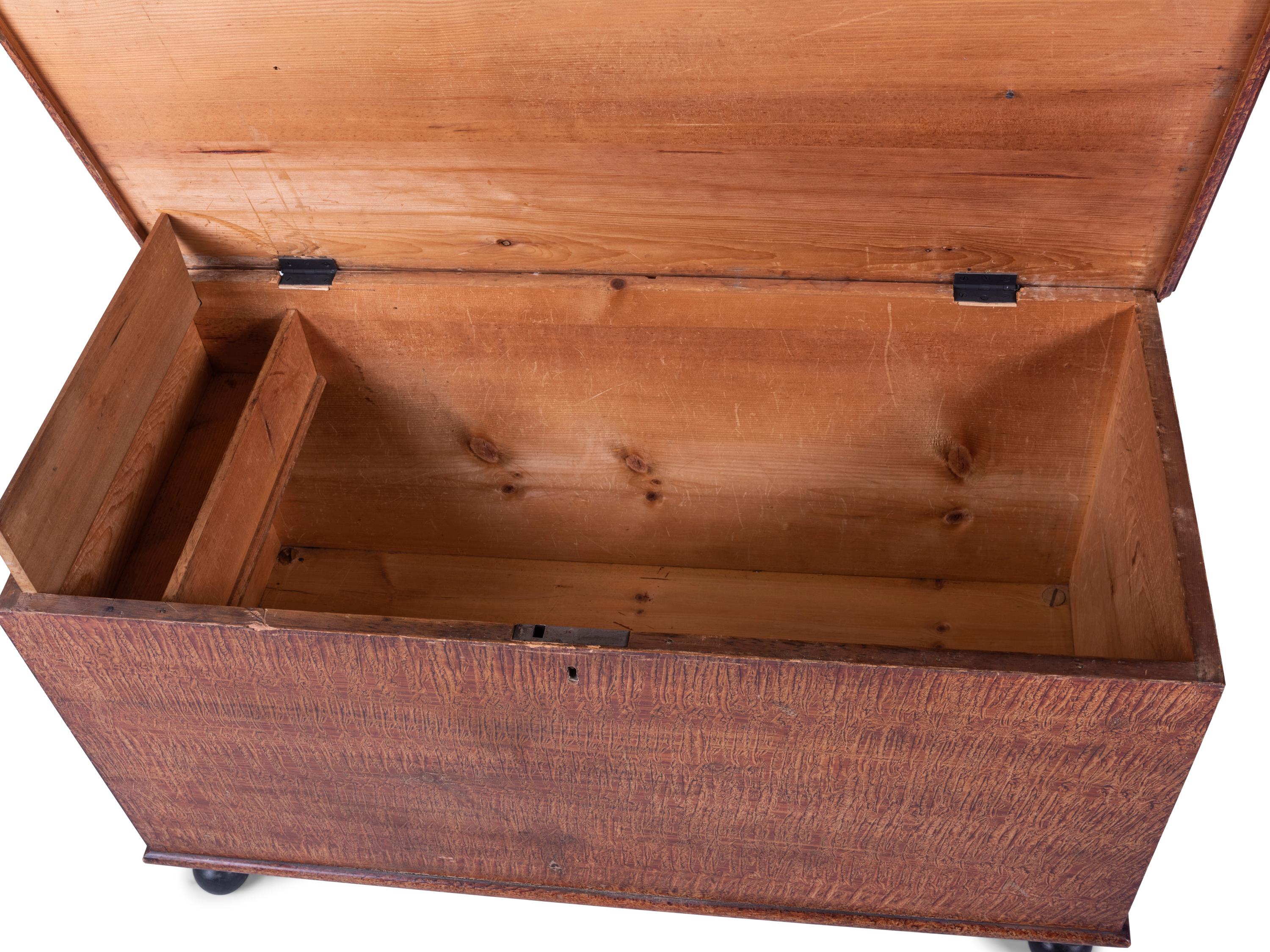 A Federal Grain-Painted Pine Blanket Chest on Bun Feet
