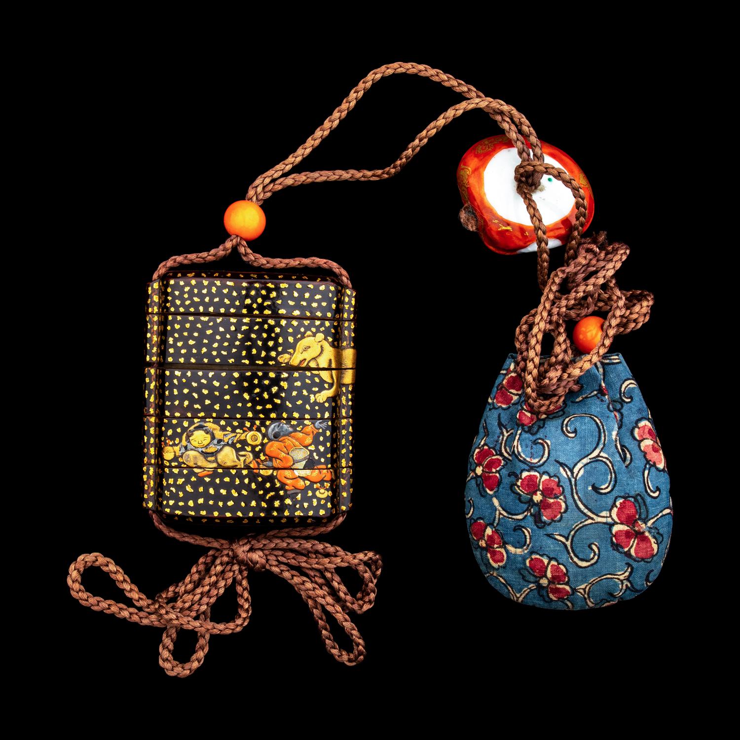 A Japanese Gold and Black Lacquer Four-Case Inro