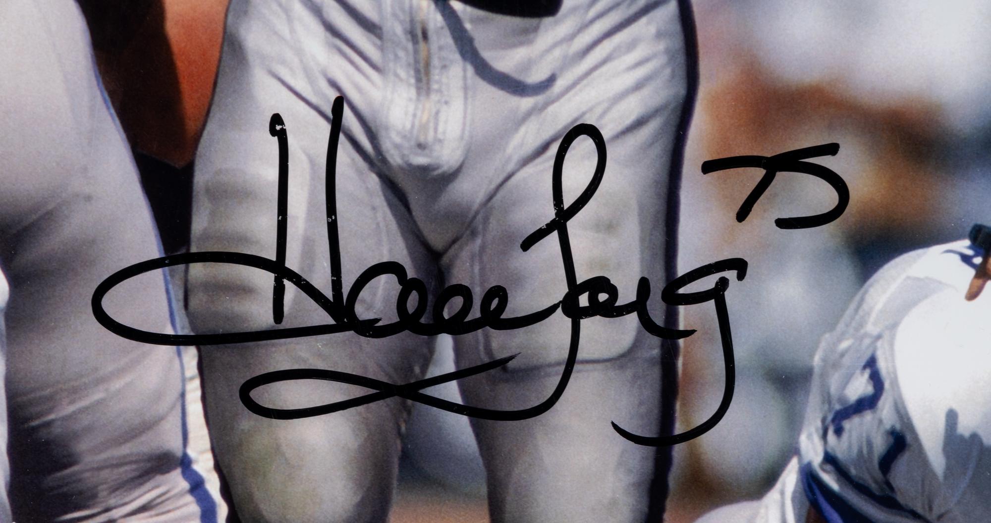 A Group of Howie Long Signed Autograph Items Featuring a Game Model Raiders Jersey
