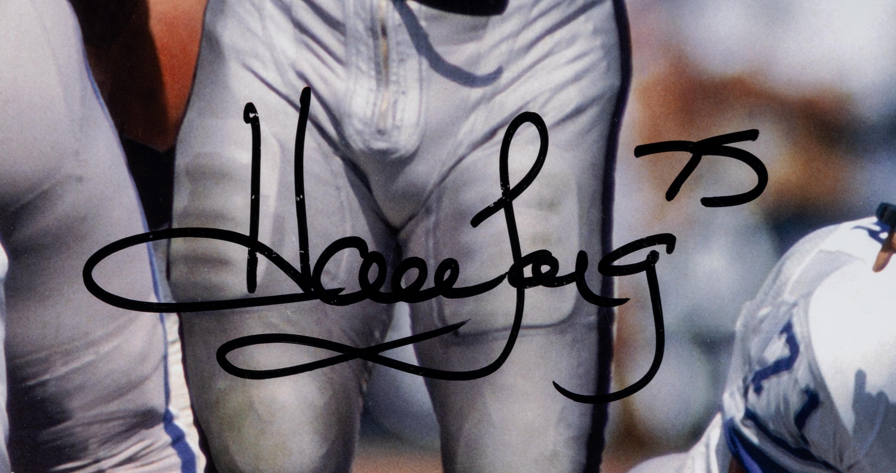 A Group of Howie Long Signed Autograph Items Featuring a Game Model Raiders Jersey