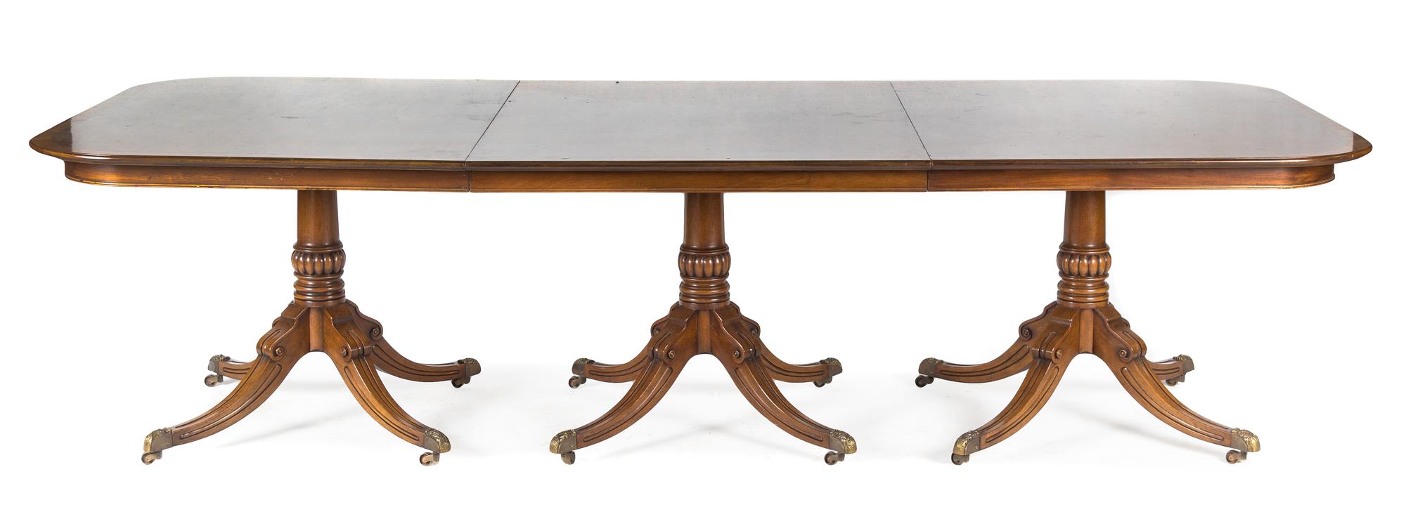 A Regency Style Mahogany Extension Table Height 29 1/2 x width 113 1/2 x depth 48 inches. — FIRST HALF 20TH CENTURY