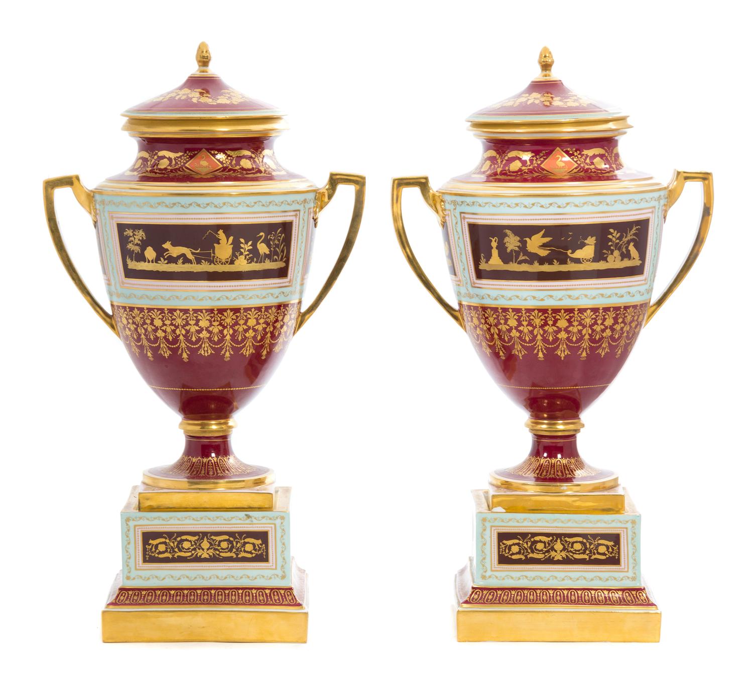 A Pair of Royal Vienna Porcelain Urns, Covers and Stands