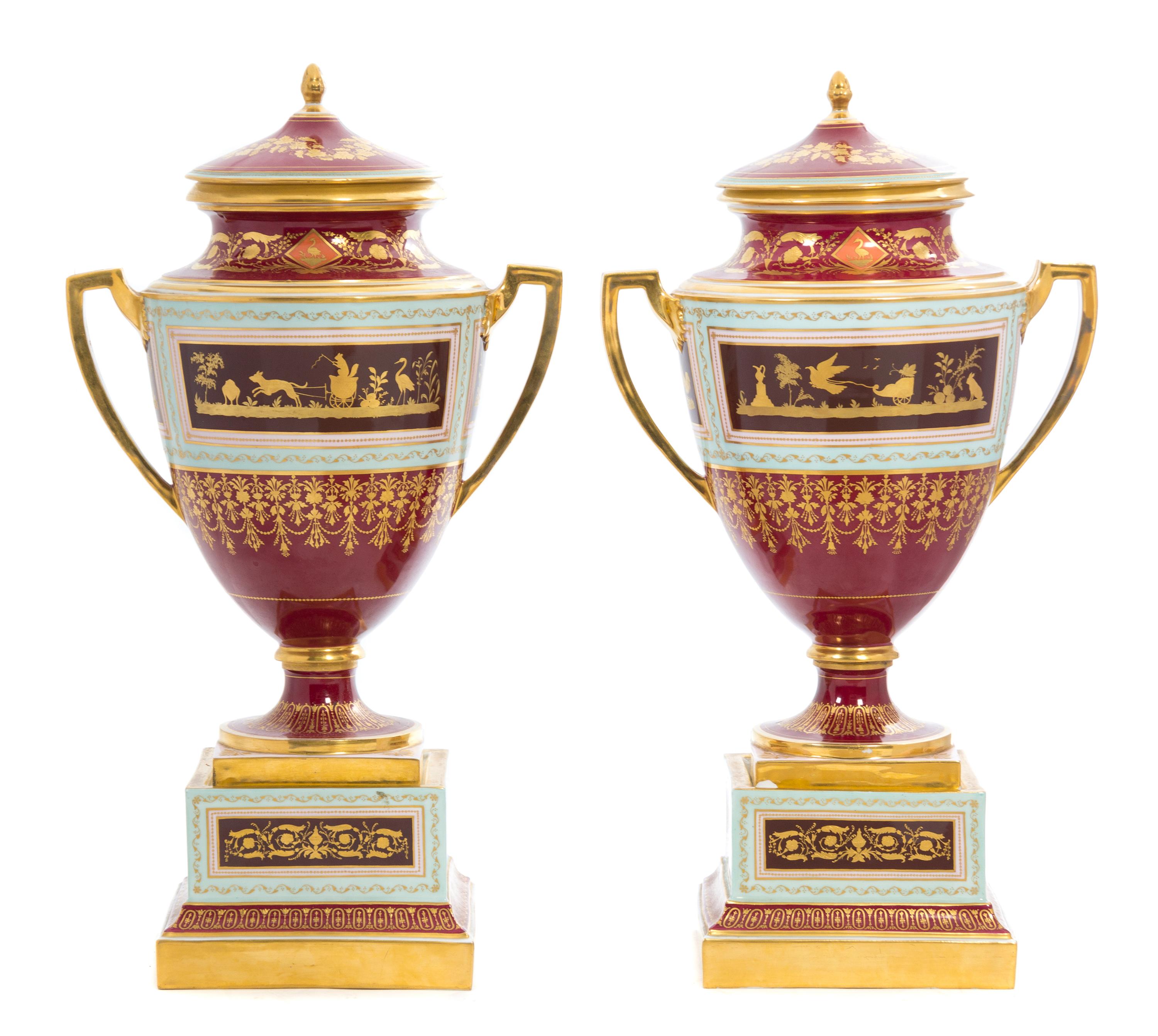 A Pair of Royal Vienna Porcelain Urns, Covers and Stands