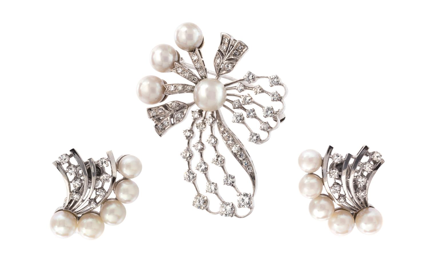 A White Gold, Cultured Pearl and Diamond Demi Parure, 17.00 dwts.