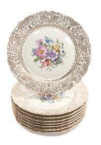A Set of Eight Bohemia Royal Ivory Porcelain Dinner Plates Diameter 10 5/8 inches.