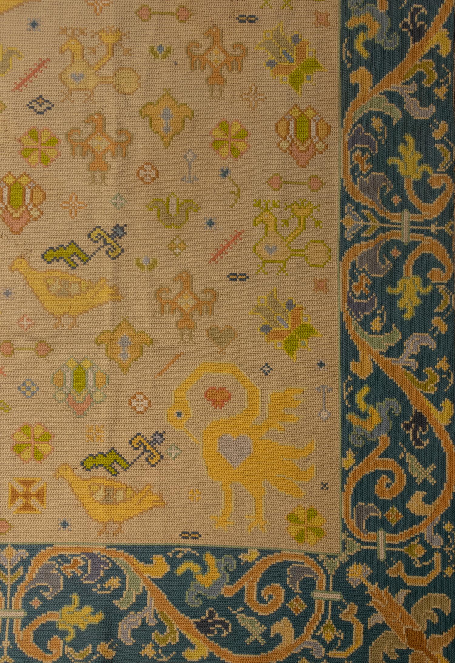 A Portuguese Needlepoint Rug