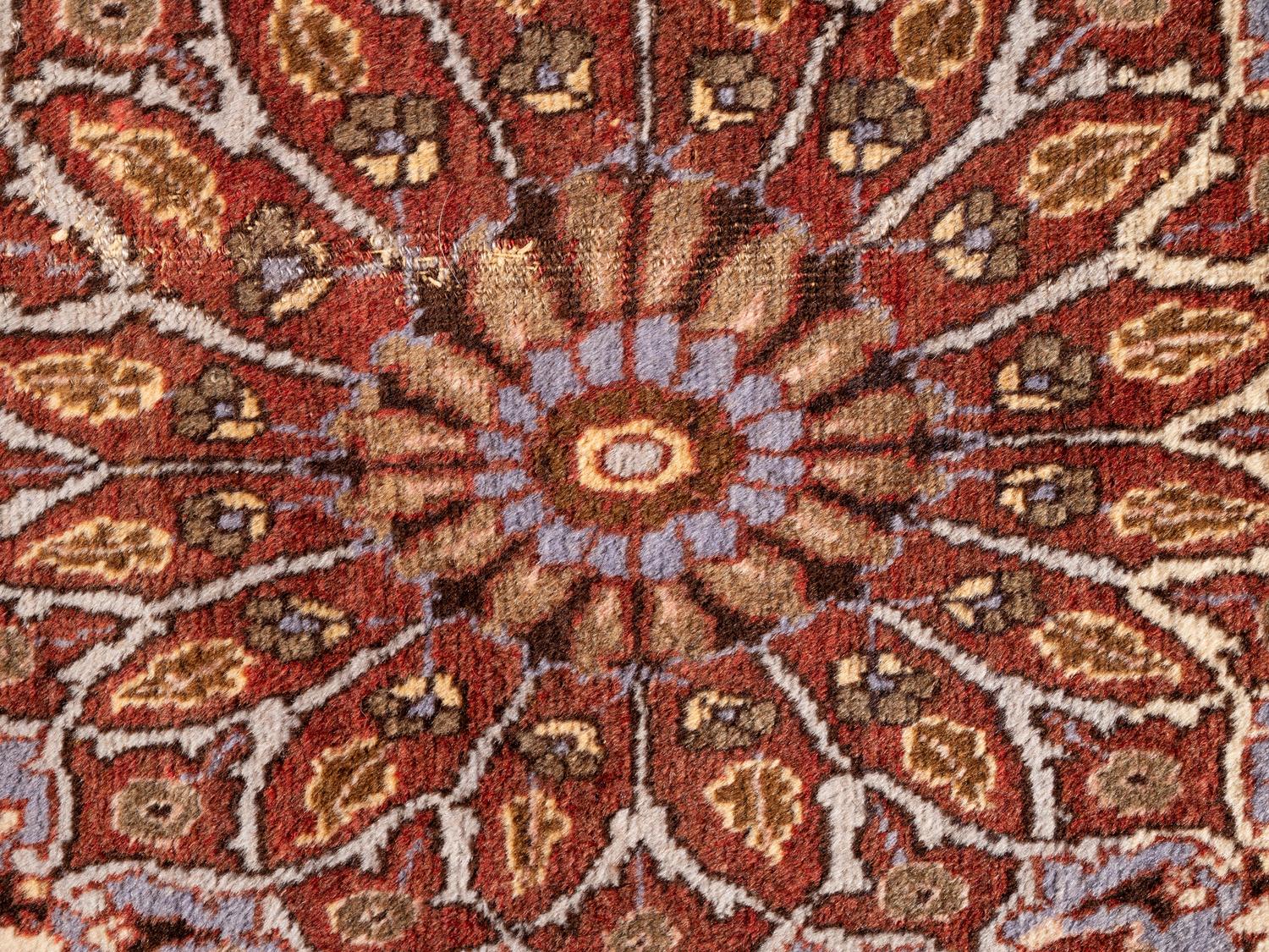 A Tabriz Wool Rug
