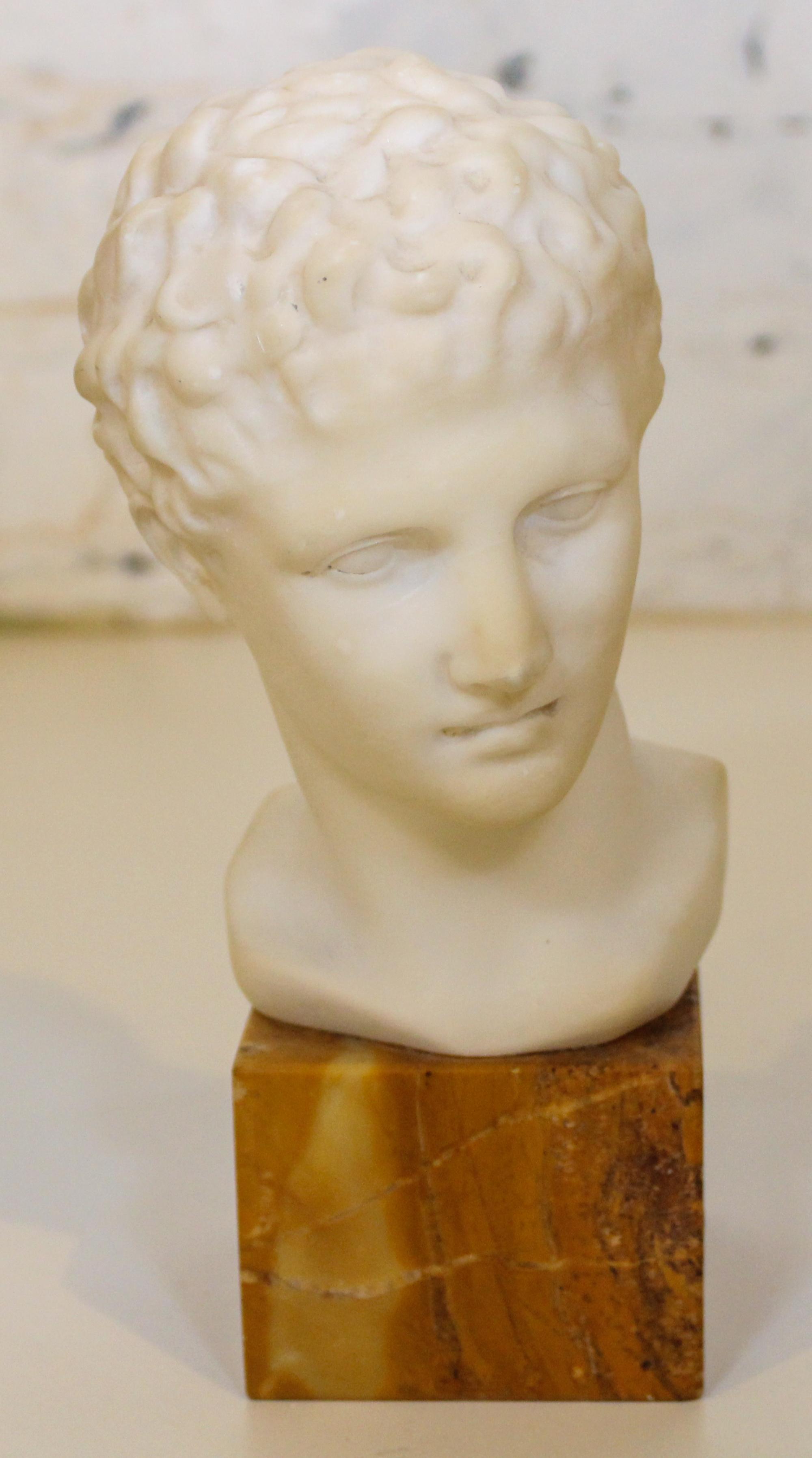 A Continental Marble Bust Height overall 8 1/2 inches.