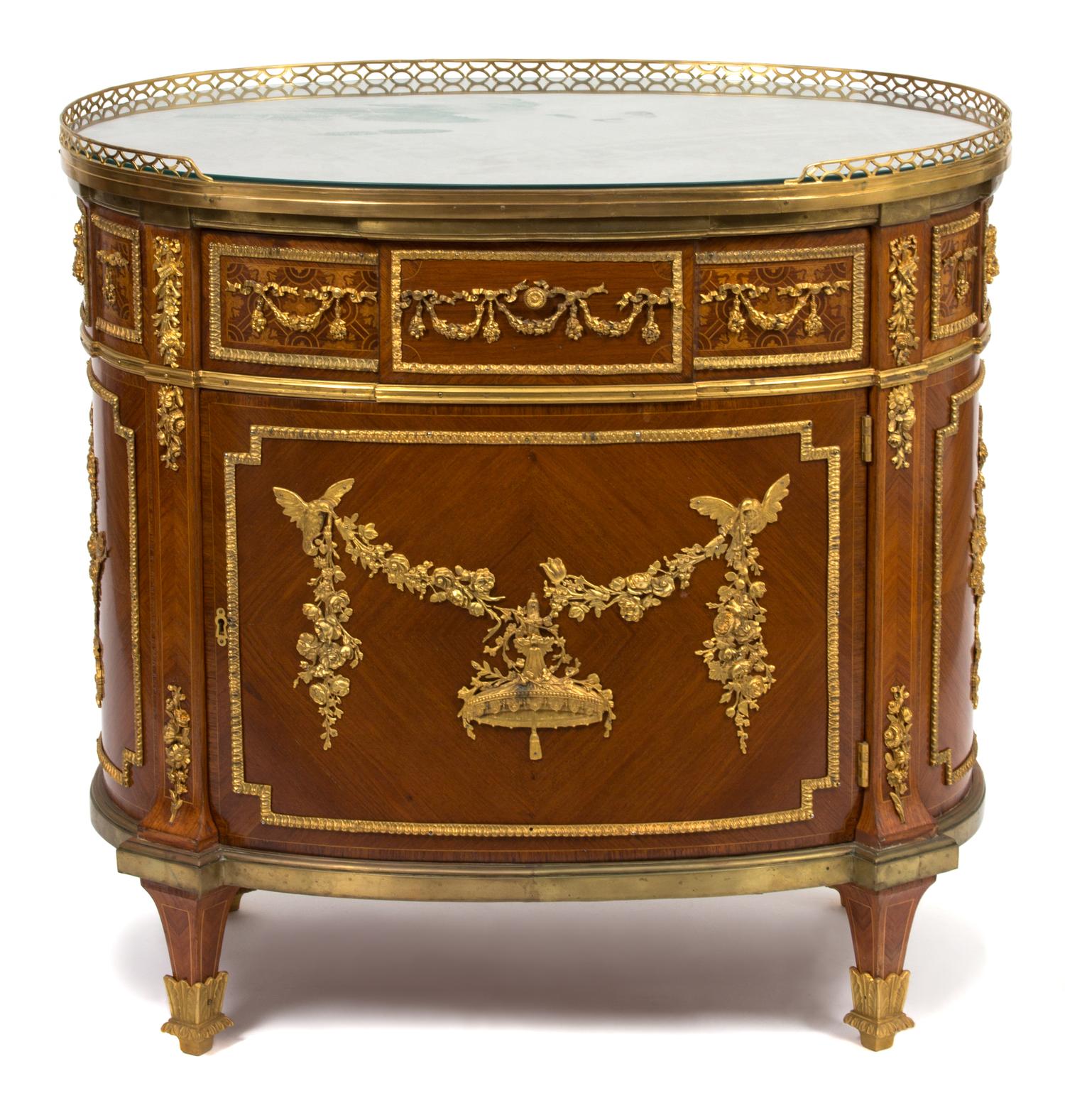 A Louis XVI Style Gilt Bronze Mounted Oval Cabinet Height 33 1/2 x width 34 1/2 x depth 23 3/4 inches. — LATE 19TH CENTURY