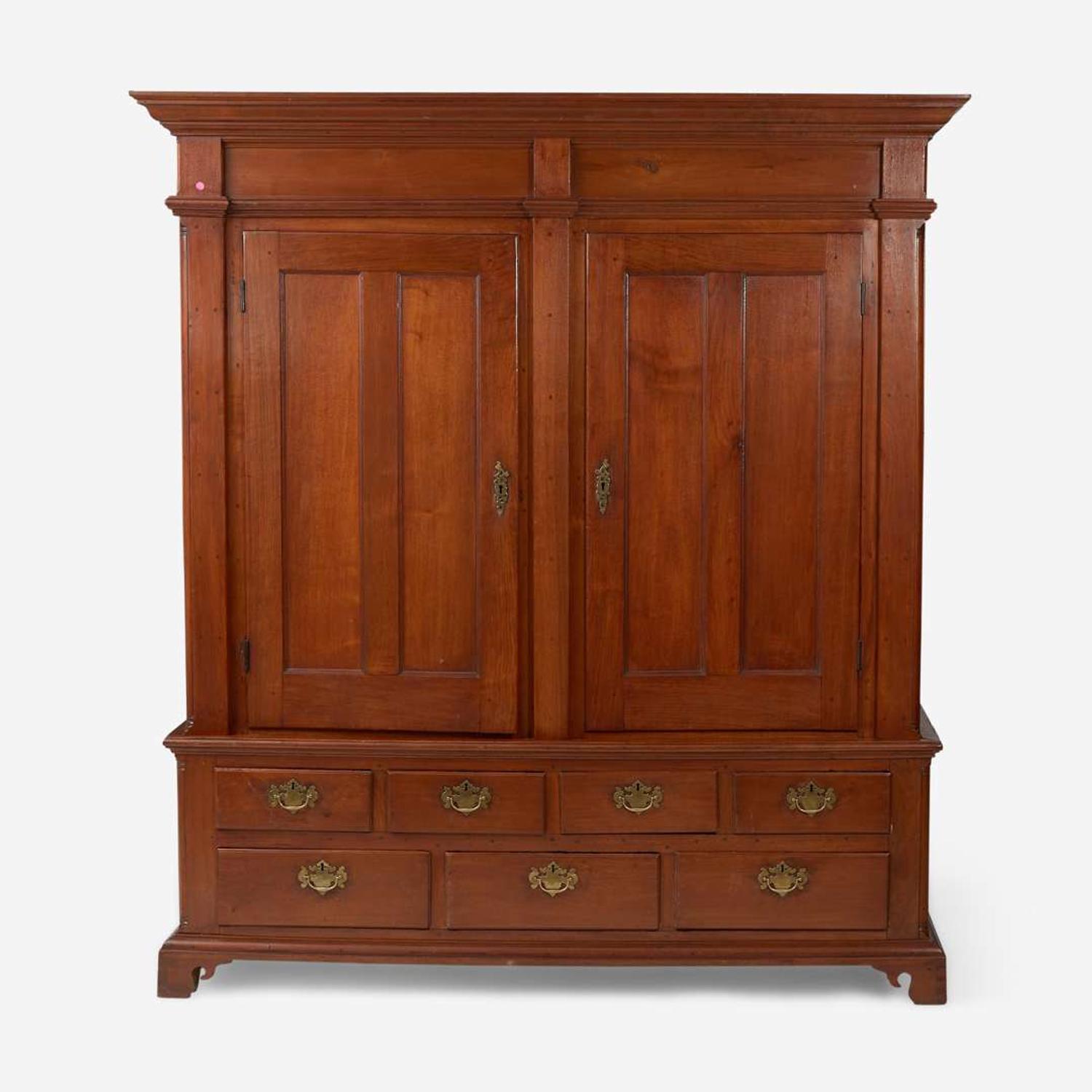 A Chippendale carved walnut cupboard Probably Lancaster County, PA, late 18th century