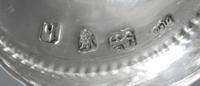 A George III Silver Caster, Hester Bateman, London, 1783, having a spiral twist finial and beaded edges.