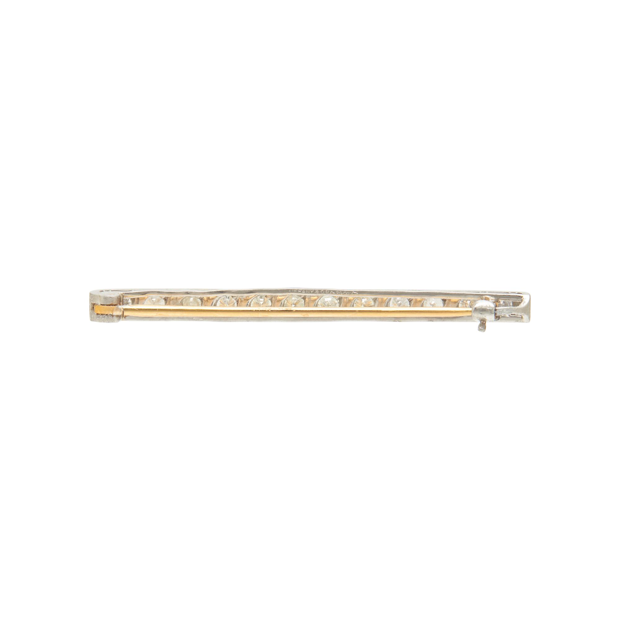 TIFFANY & CO., PLATINUM, YELLOW GOLD, AND DIAMOND BAR PIN