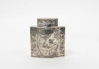 A Continental Silver Tea Caddy, Probably Dutch, 19th Century, each side with a central cartouche depicting figures in a landscape.