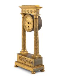 An Empire Gilt-Bronze Mantle Clock