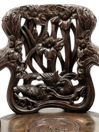 A Chinese Export Carved Hardwood Armchair
