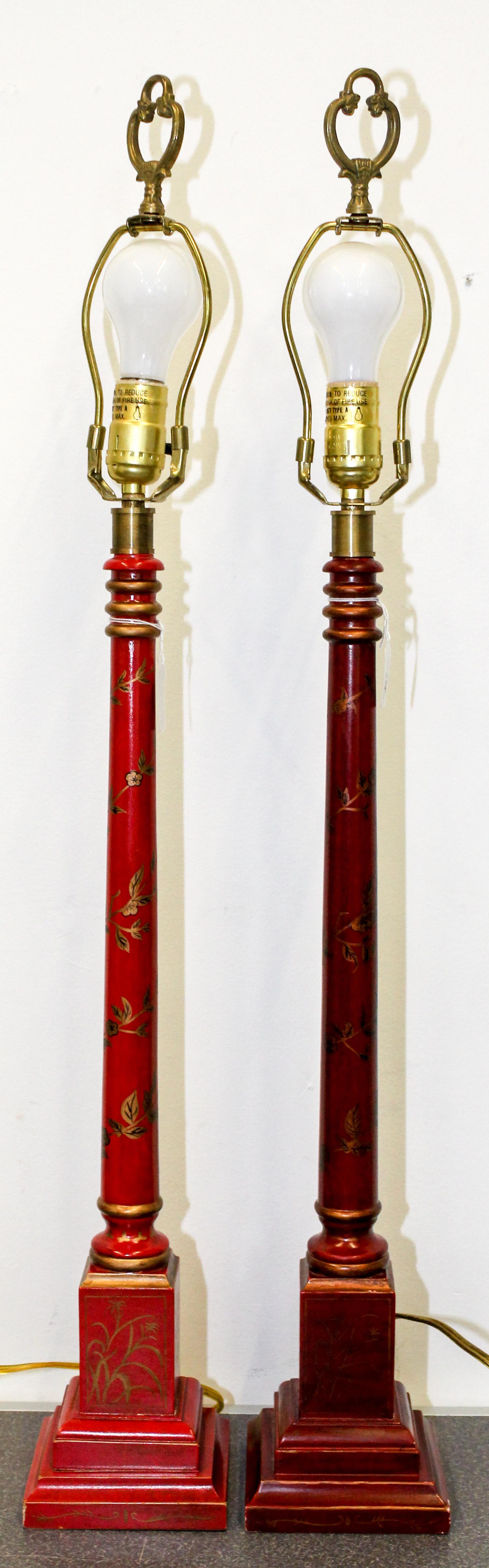 A Pair of Red Painted Table Lamps Height overall 34 inches. — LATE 20TH CENTURY