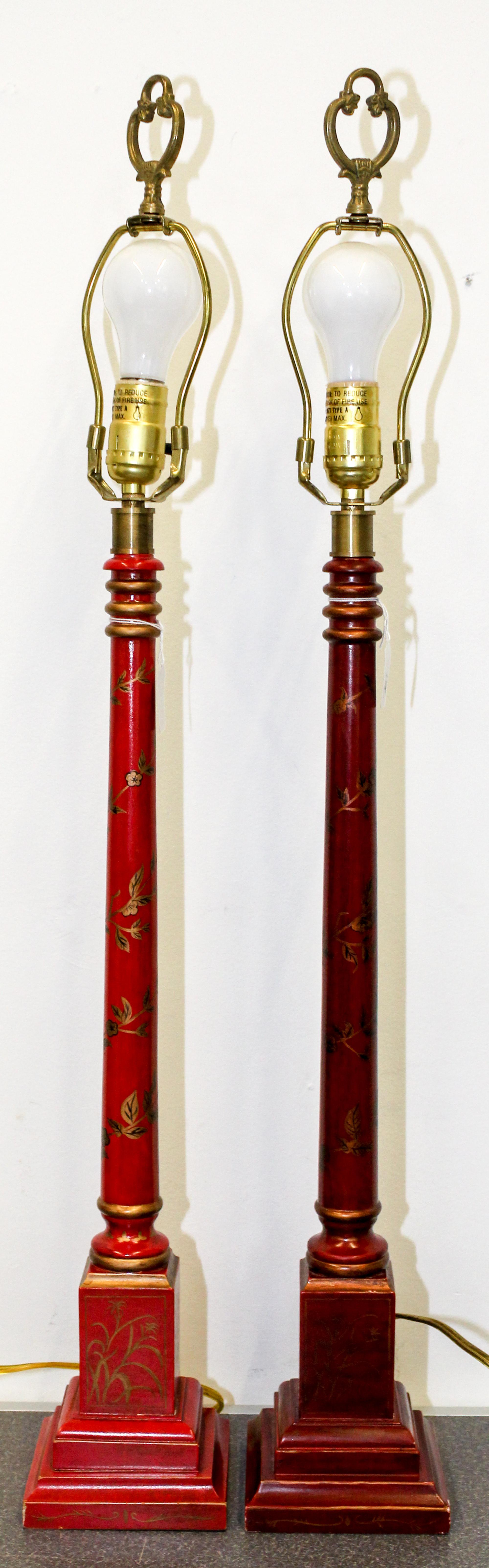 A Pair of Red Painted Table Lamps Height overall 34 inches. — LATE 20TH CENTURY