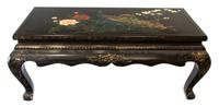 A Black and Flowered Chinese Lacquered Low Table Height 17 x width 41 x depth 21 inches.