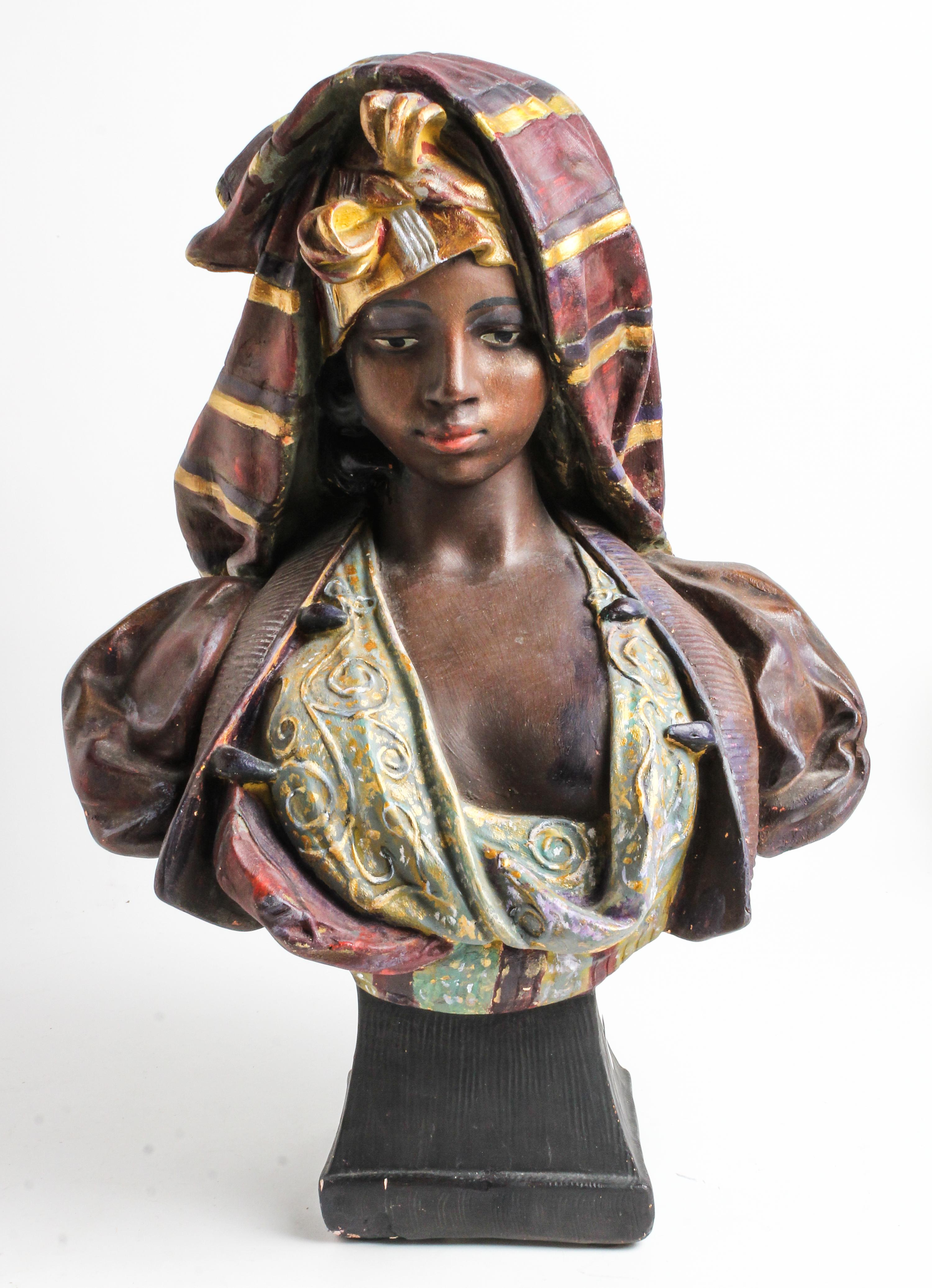 A Painted Wood Bust of an Arab Woman Height 19 1/2 inches. — 20TH CENTURY