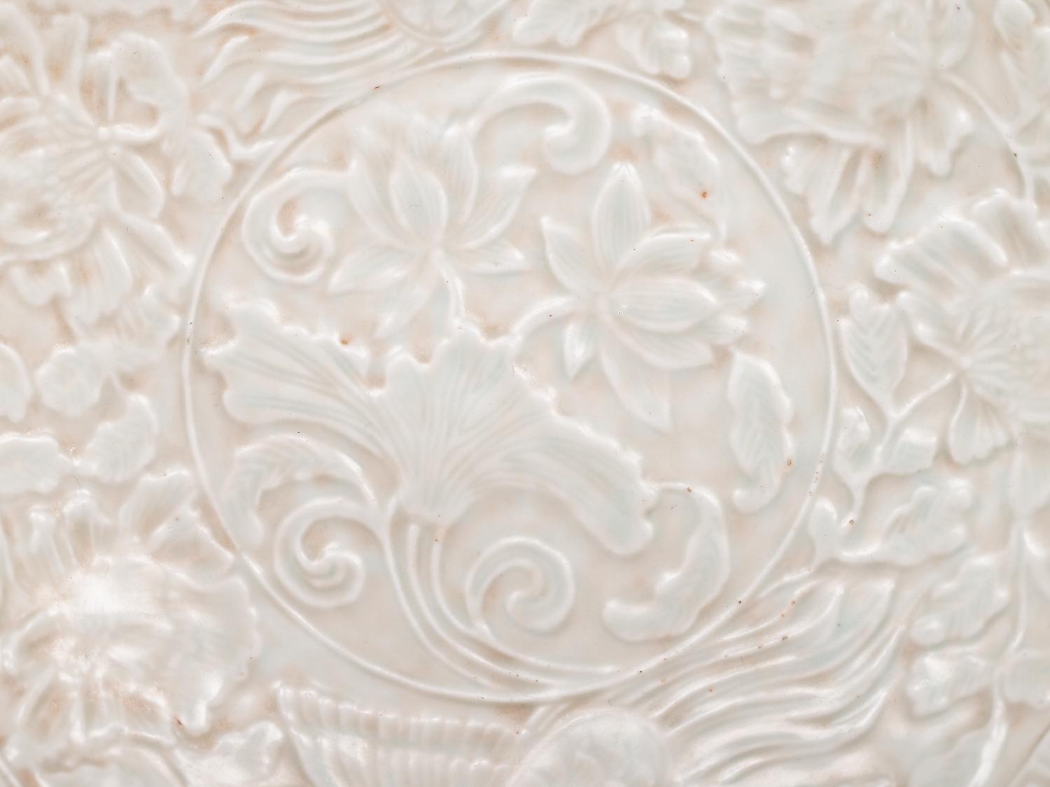 A Chinese Dingyao Style White Glazed Molded Porcelain Bowl