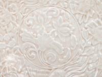 A Chinese Dingyao Style White Glazed Molded Porcelain Bowl