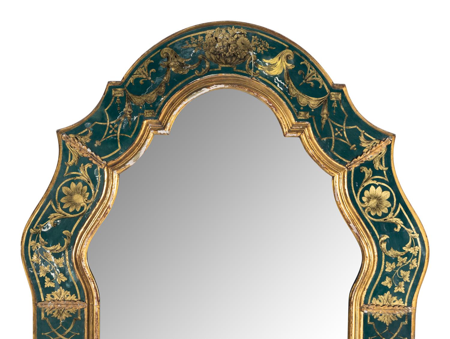 A Baroque Style Reverse Painted Glass and Giltwood Mirror