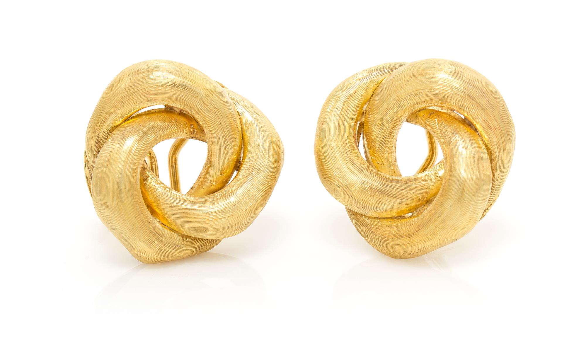 A Pair 18 Karat Yellow Gold Earclips, 9.15 dwts.