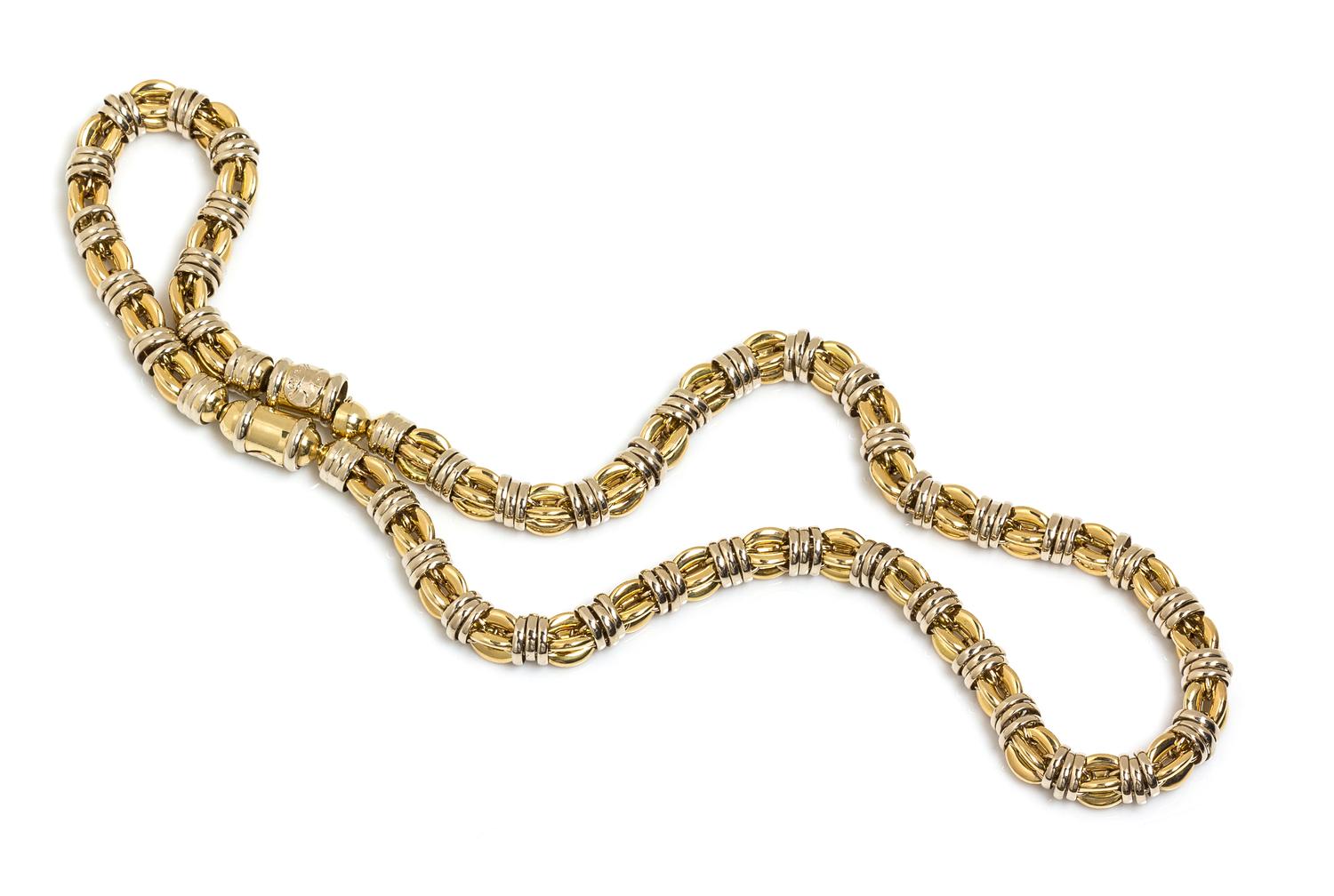 A Convertible 18 Karat Bicolor Gold Fancy Link Demi-Parure, Sauro, 91.15 dwts.