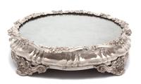 A Continental Silver Plate Mirror Top Plateau, 19TH CENTURY, having scrolll and oak leaf border and feet.