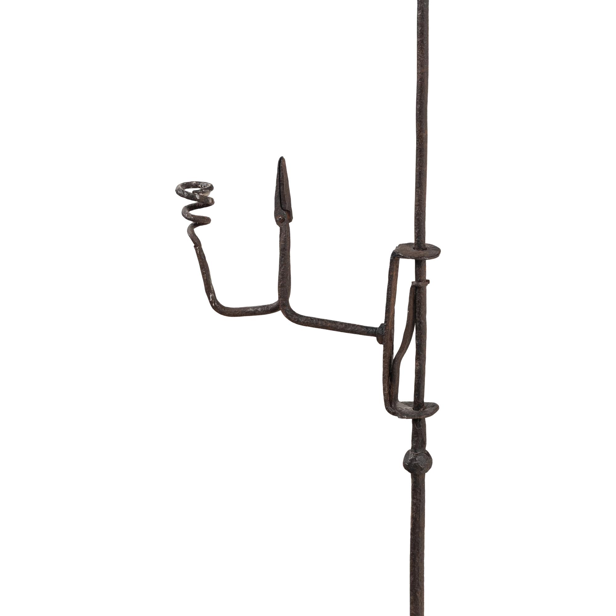 A Wrought Iron Composite Candlestick and Rush Light Stand