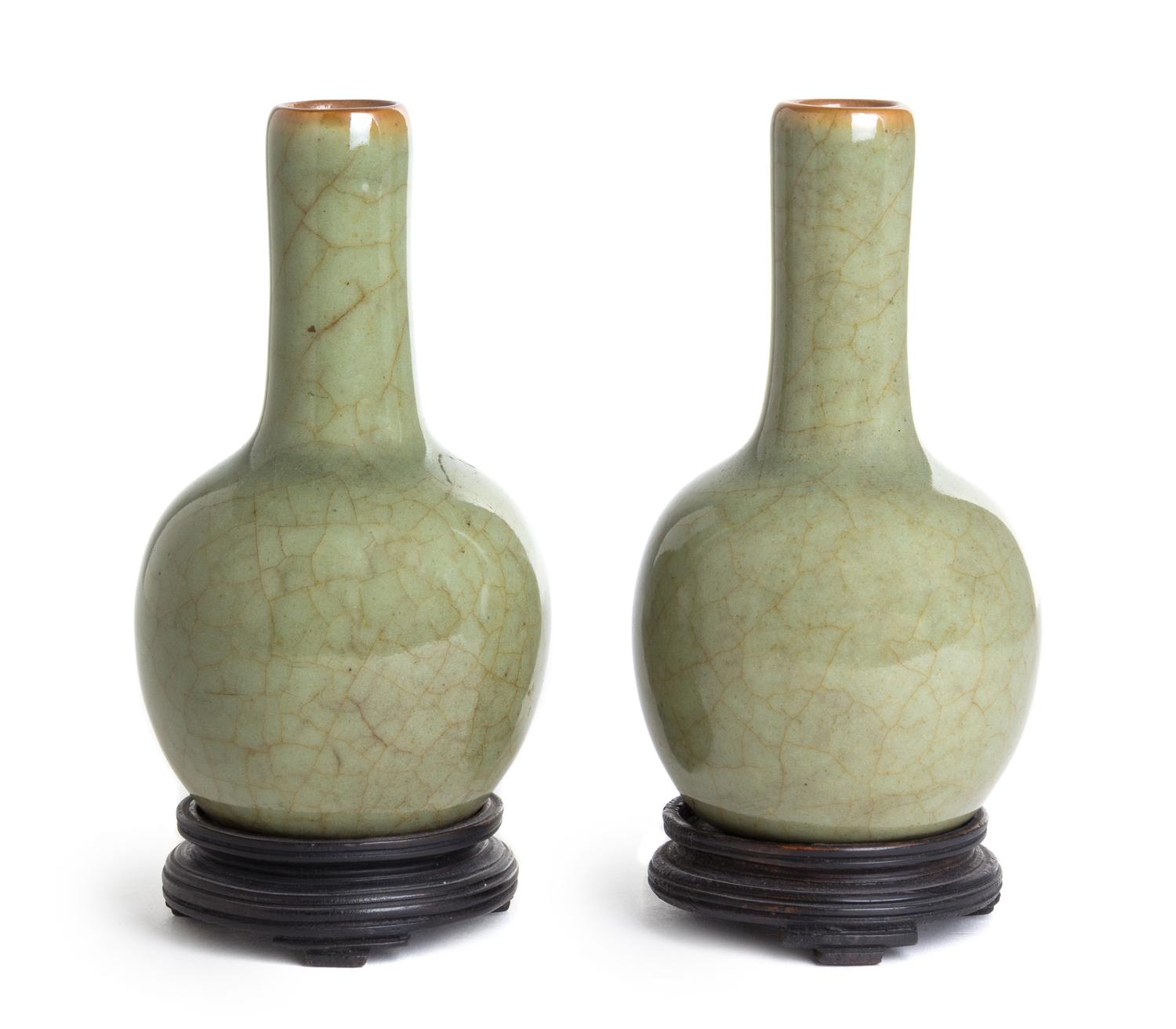 A Small Pair of Celadon Glazed Porcelain Bottle Vases Height 4 3/4 inches. — 19TH CENTURY